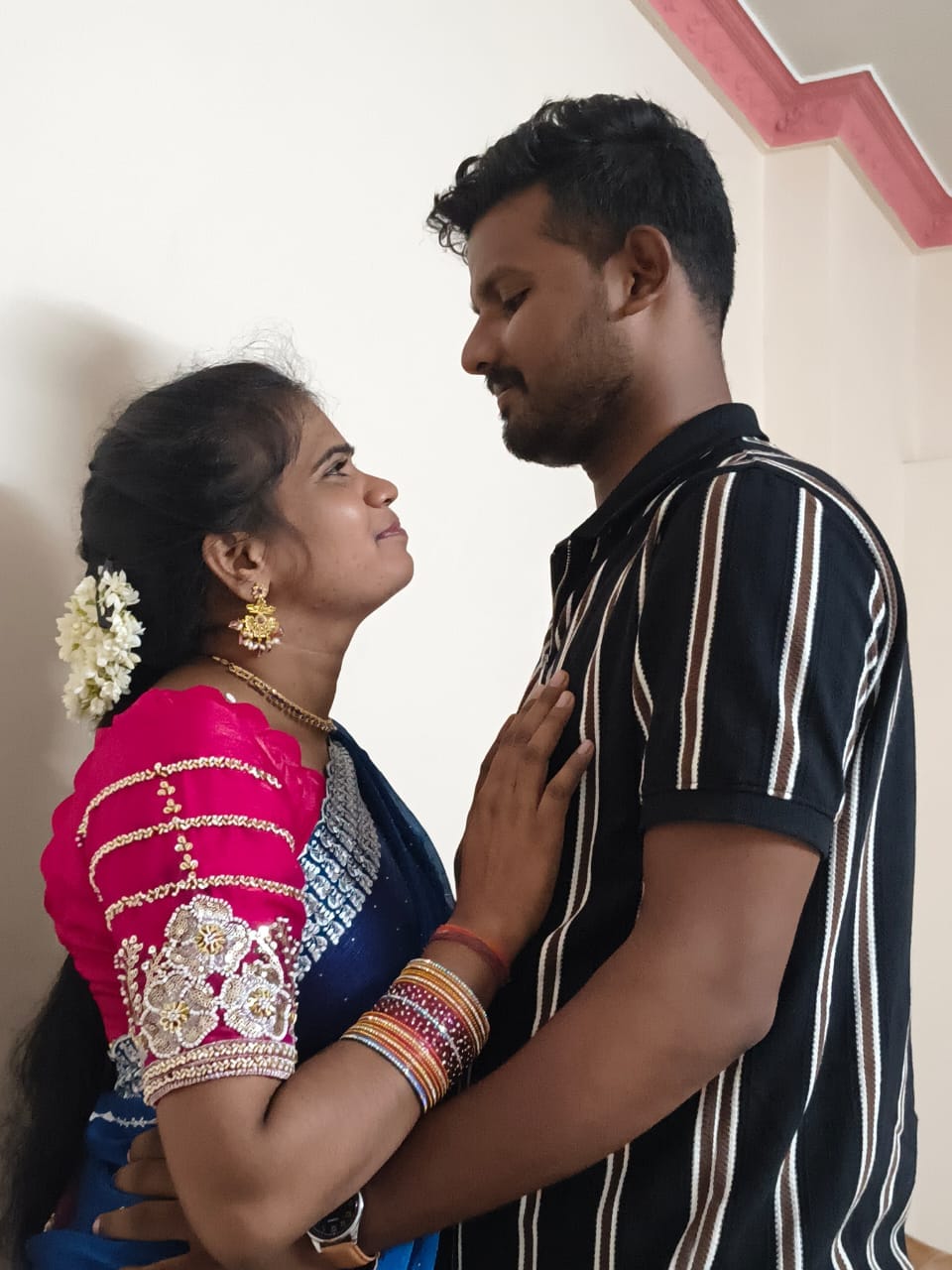 Sai Gopi and Sirisha looking at each other